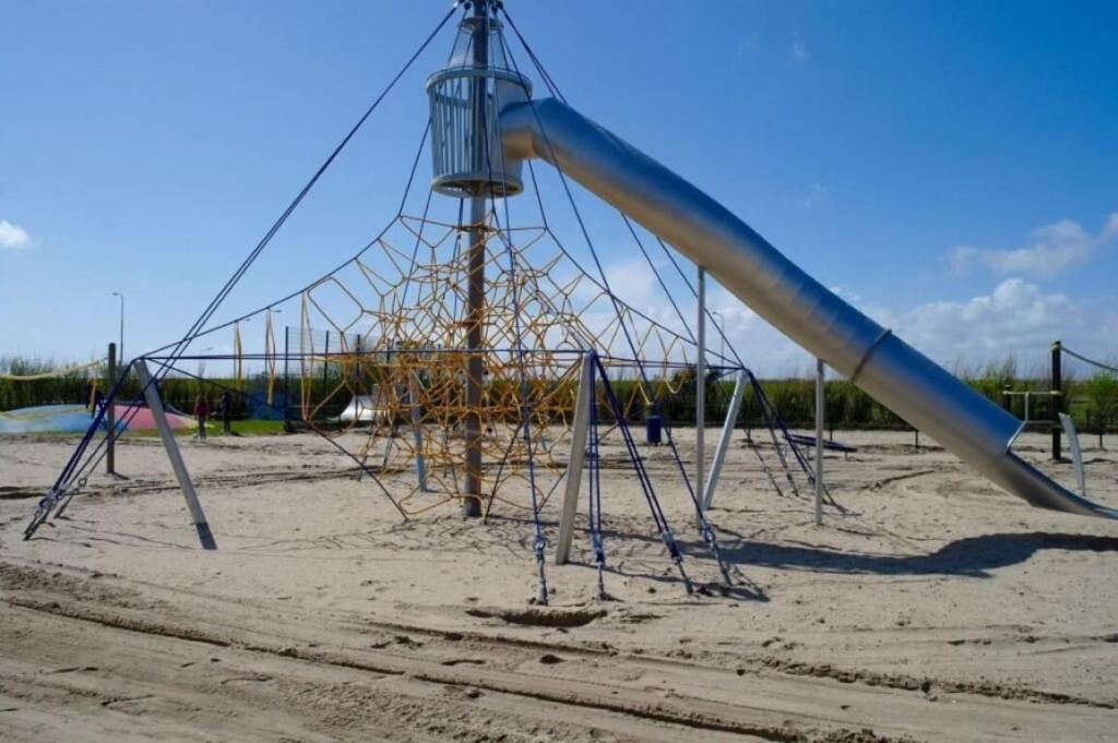Strandhuis De Zon - Recreatiepark De Watersnip Petten Esterno foto