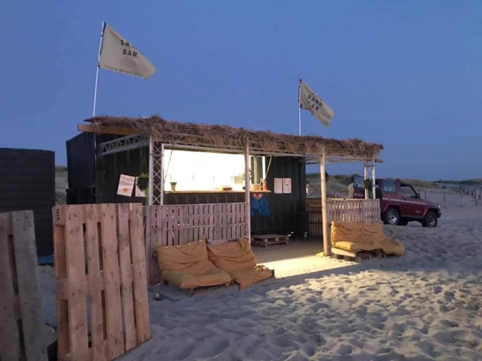Strandhuis De Zon - Recreatiepark De Watersnip Petten Esterno foto