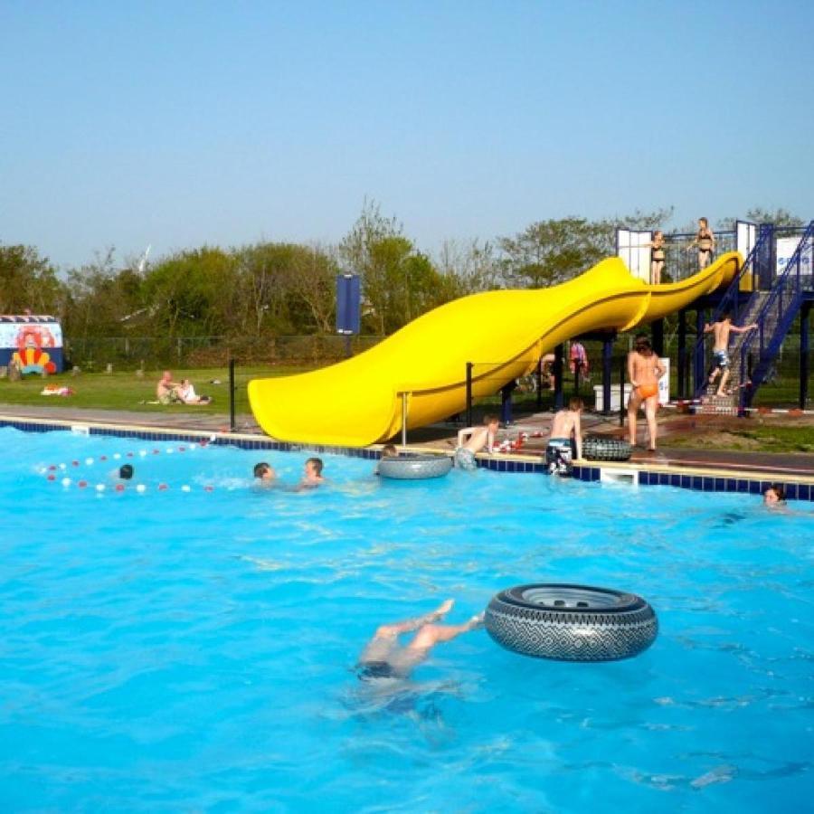 Strandhuis De Zon - Recreatiepark De Watersnip Petten Esterno foto